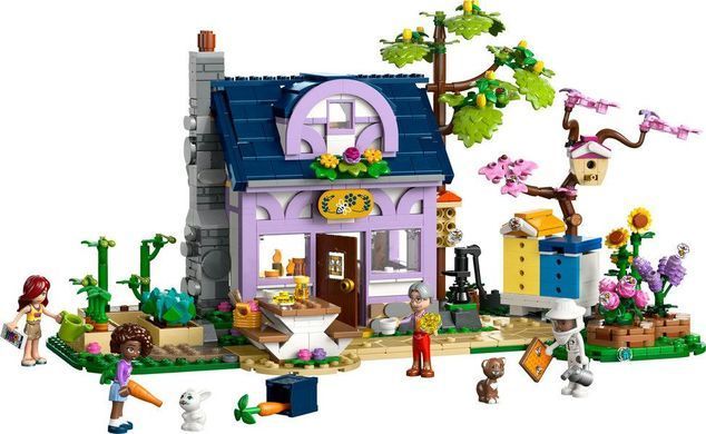 Конструктор LEGO Friends Будиночок і квітник бджолярів 42669